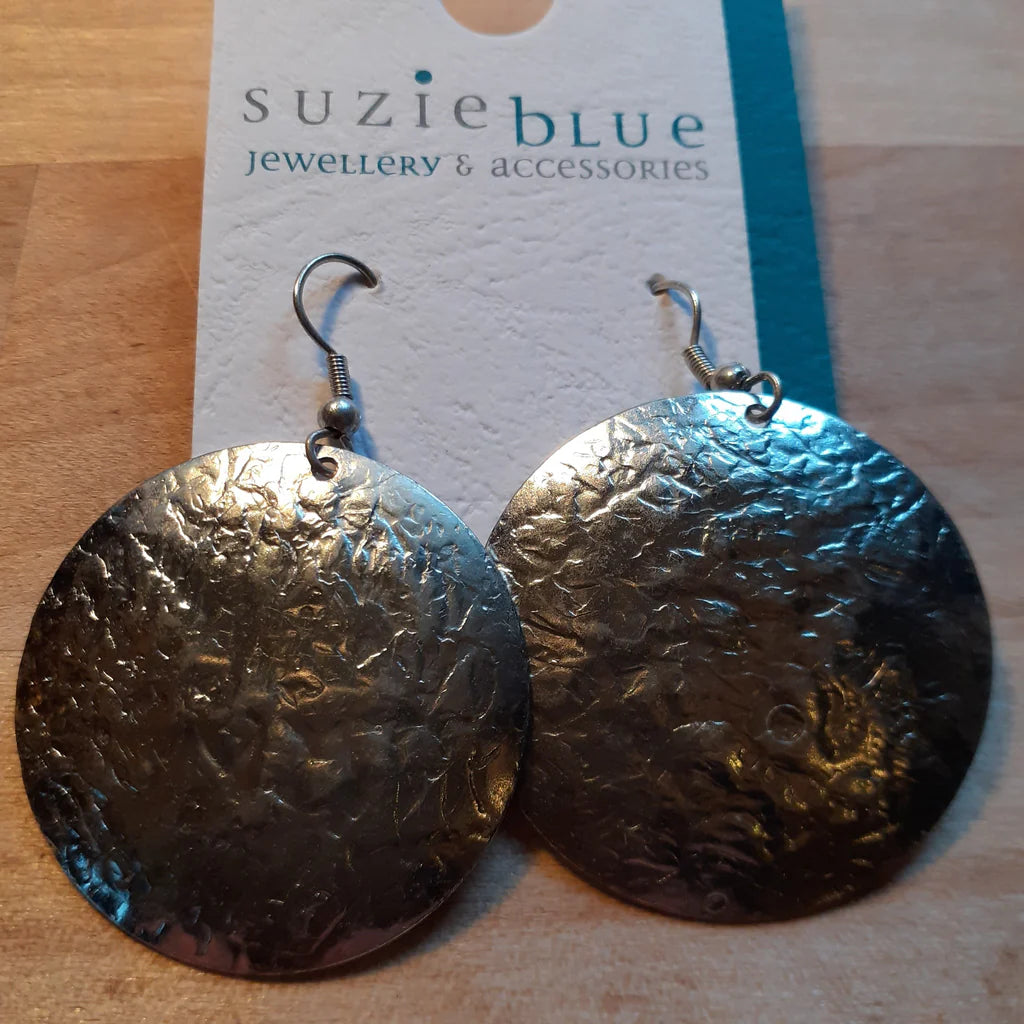 Silver textured earrings on a 'Suzie Blue' branded card.