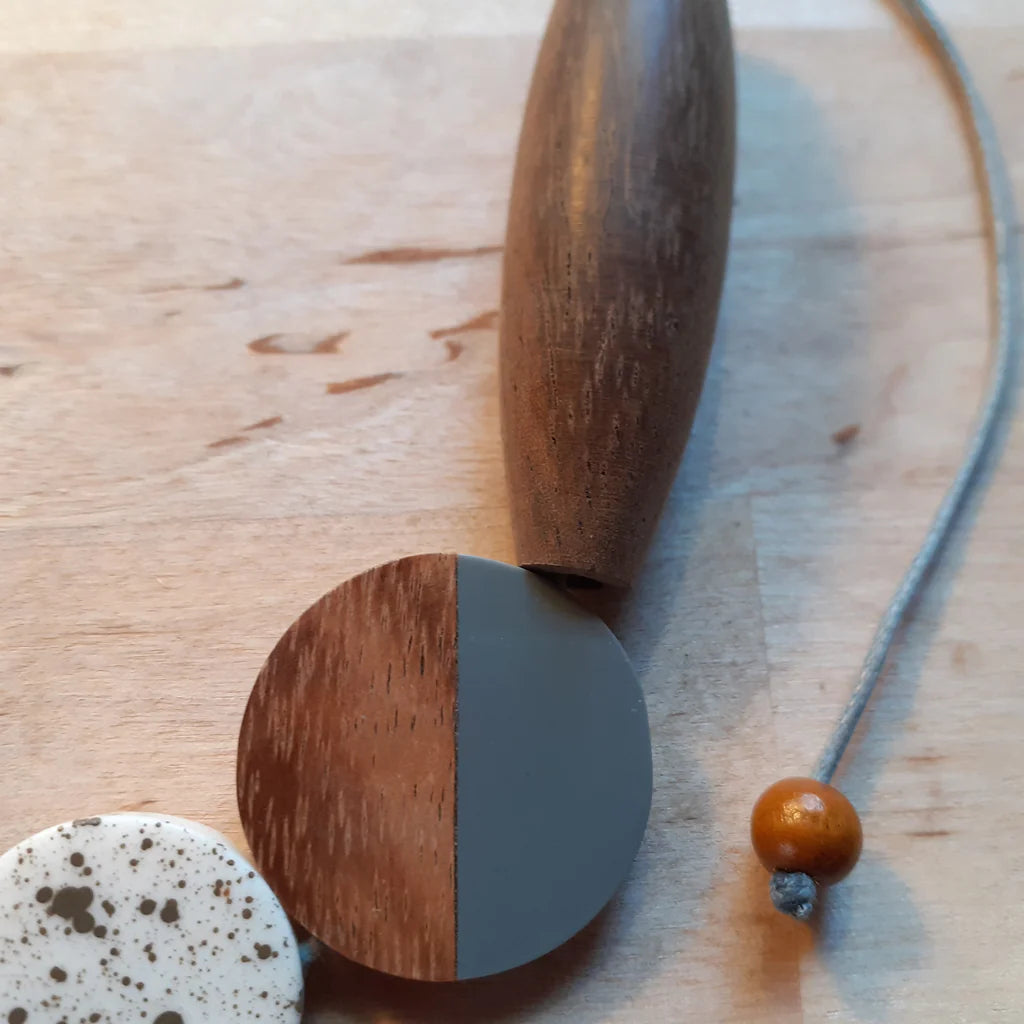 Wooden and ceramic items on a wooden surface
