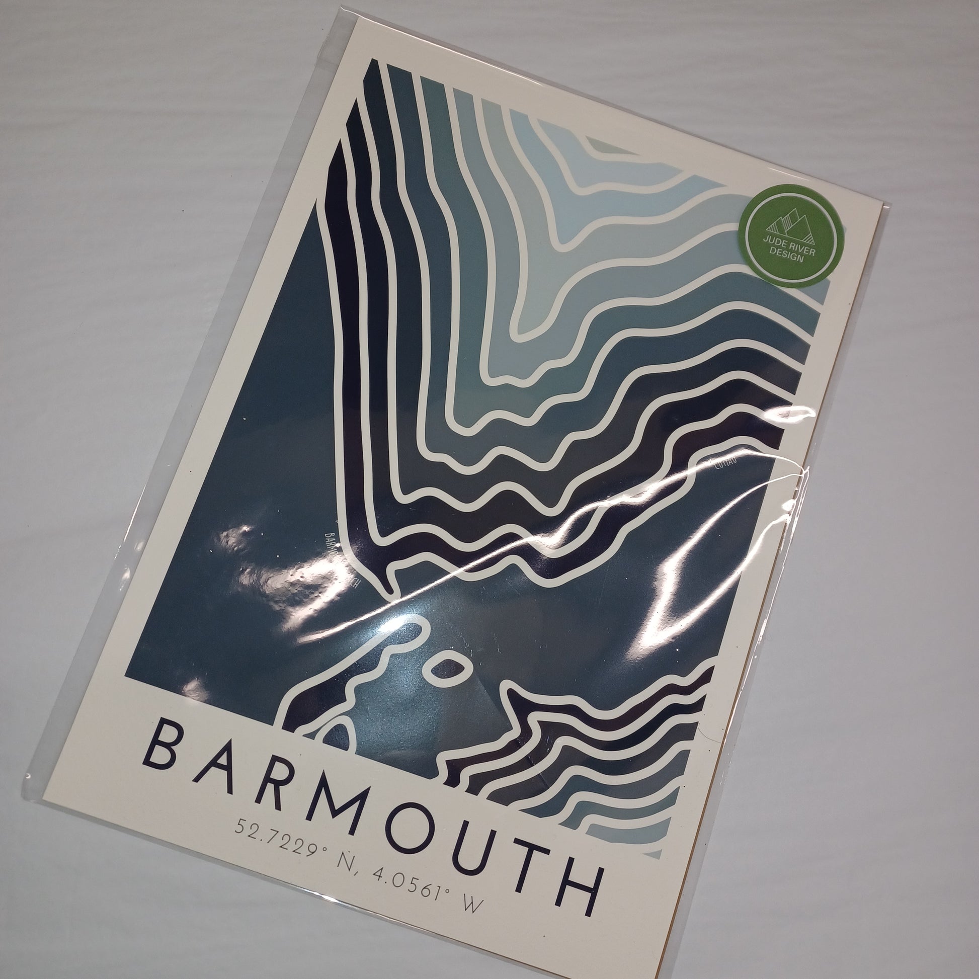 Poster with wavy line design and 'Barmouth' text on a gray background