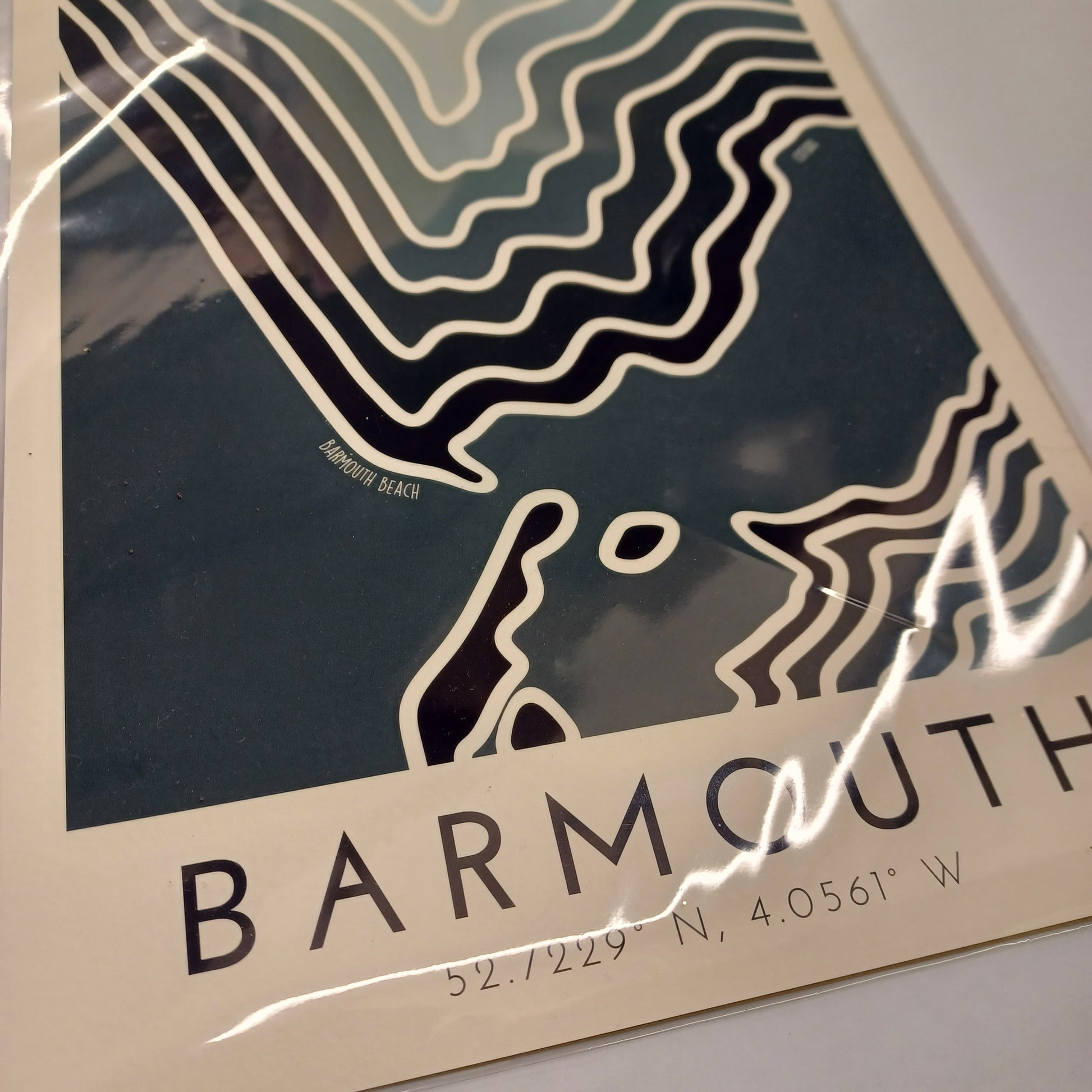 Poster with topographic design and text on a plain background