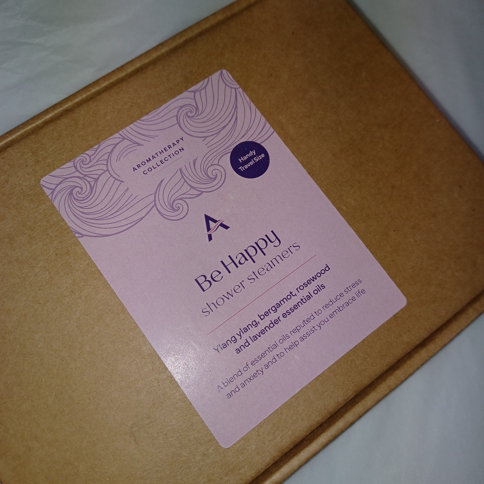 Brown box with a pink label featuring 'Bellepity' on a white background