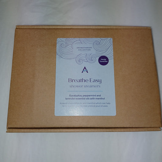 Brown cardboard box with a 'Breathe Easy' product label on a white background