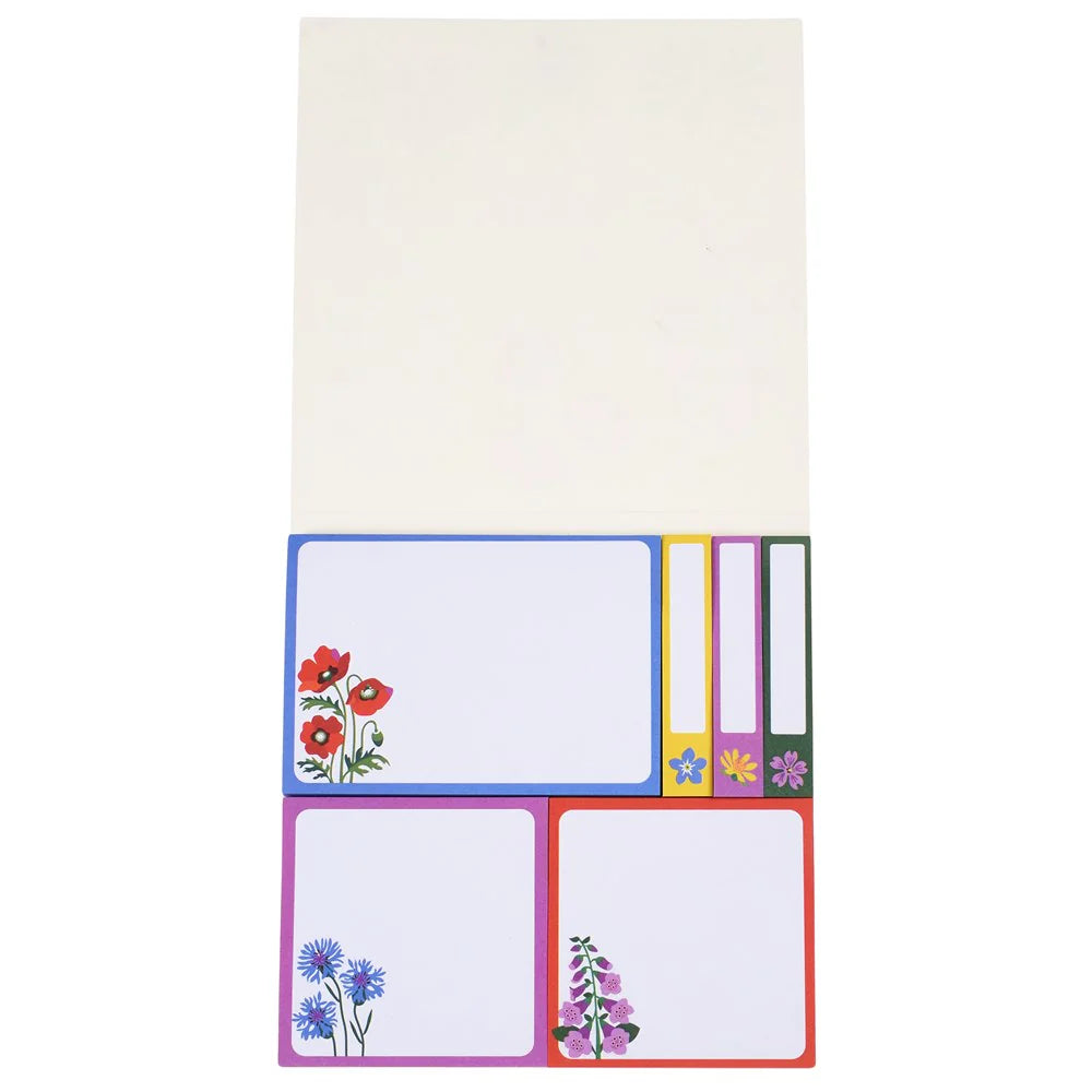 Set of colorful sticky notes with floral designs on a white background