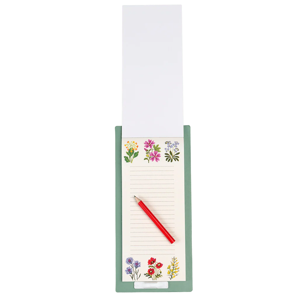 Floral notepad with a pen on a white background