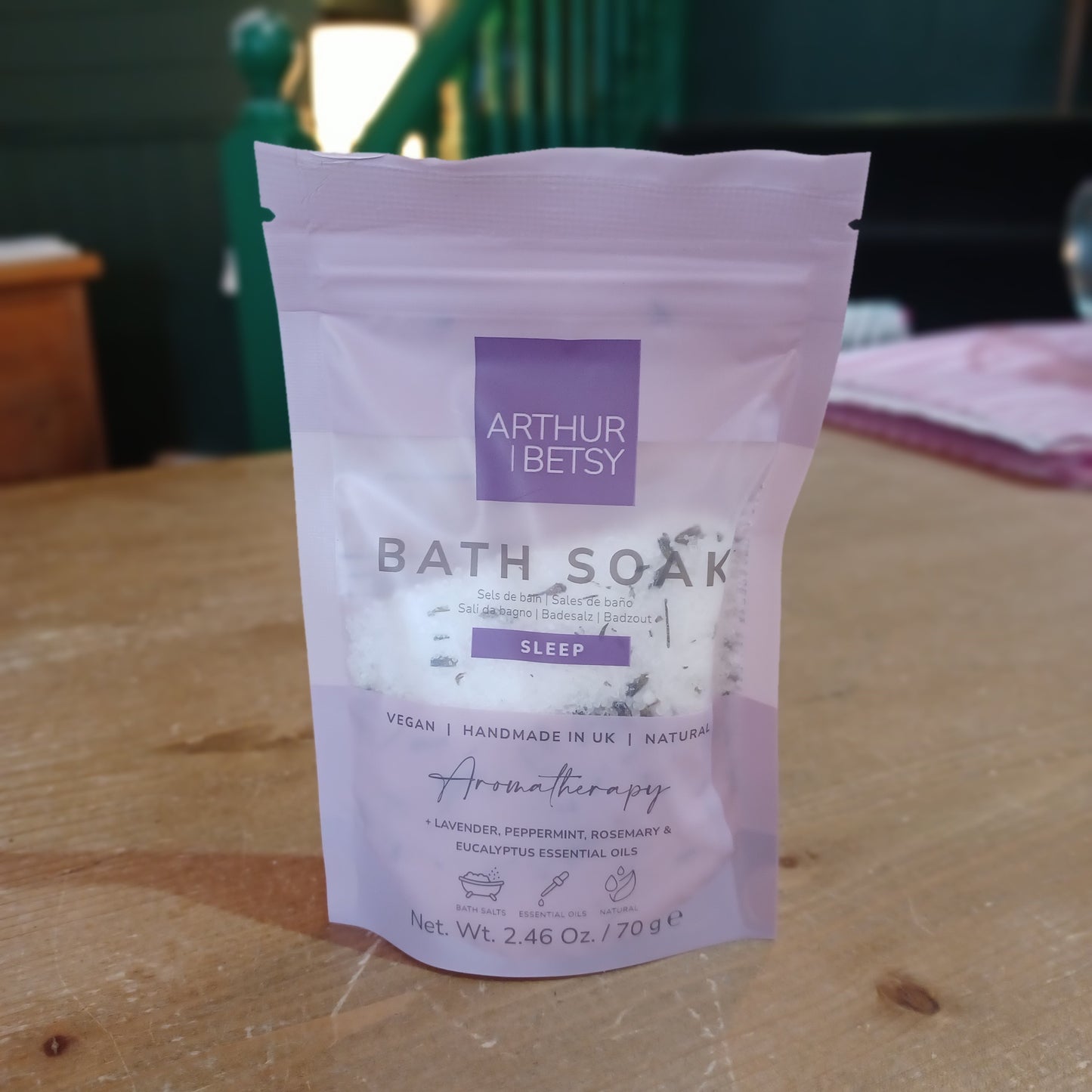Bath soak packet by Arthur &etsy on a wooden surface