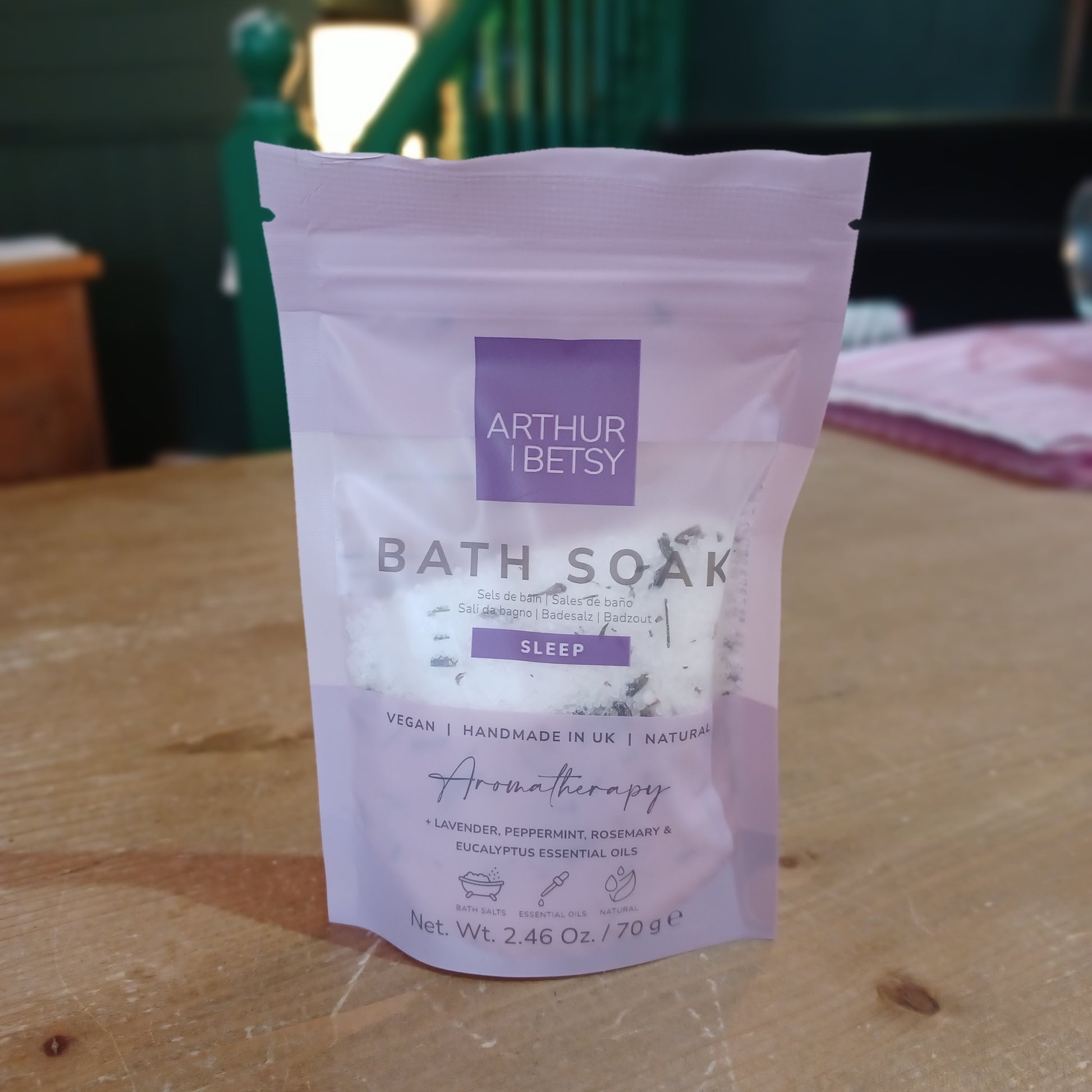Bath soak packet by Arthur &etsy on a wooden surface