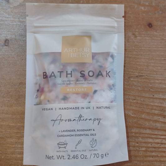 Bath soak package on a wooden surface