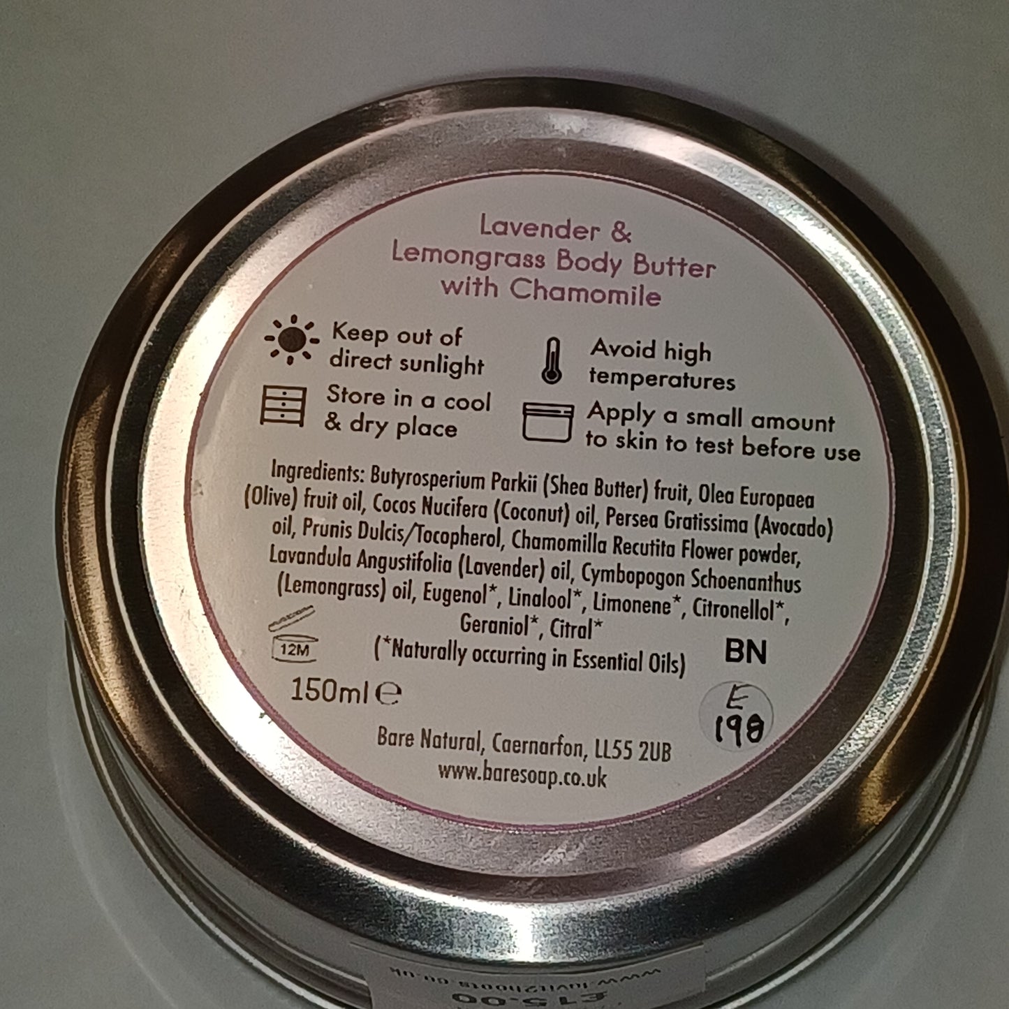 Close-up of a product label with text and symbols on a white background
