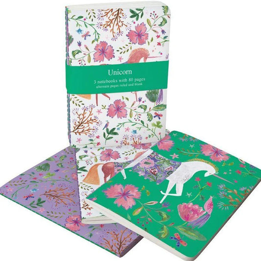 Set of notebooks with floral and unicorn designs on a white background